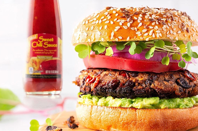 Hamburger on a white surface.