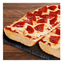Pepperoni French bread pizza on a granite slate and wooden table top.