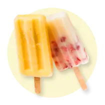 A mango coconut and strawberries and cream pop side by side on a yellow circle.